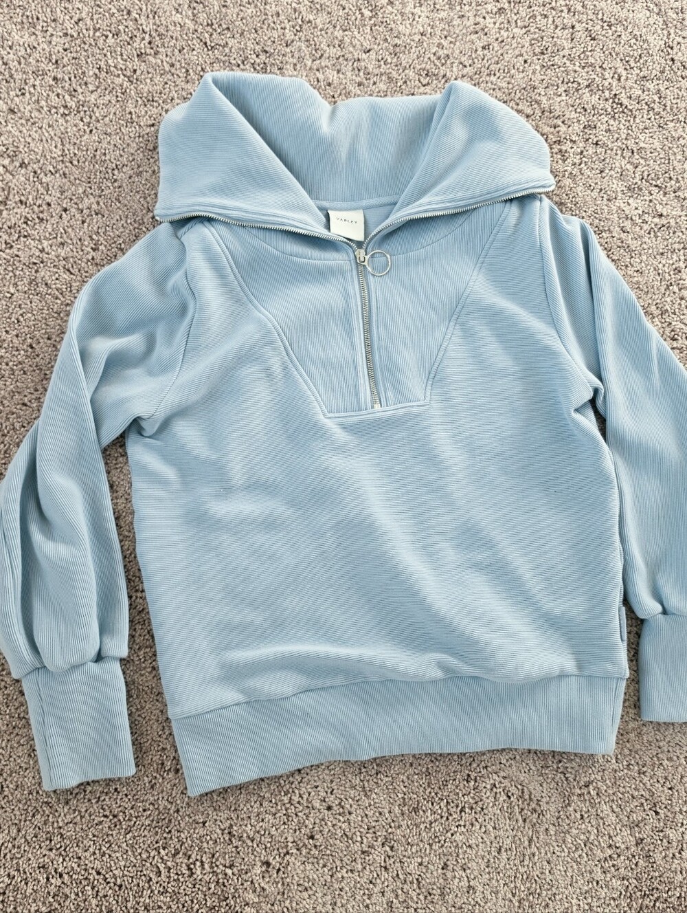 Varley Vine Half-Zip Pullover in a light blue shade